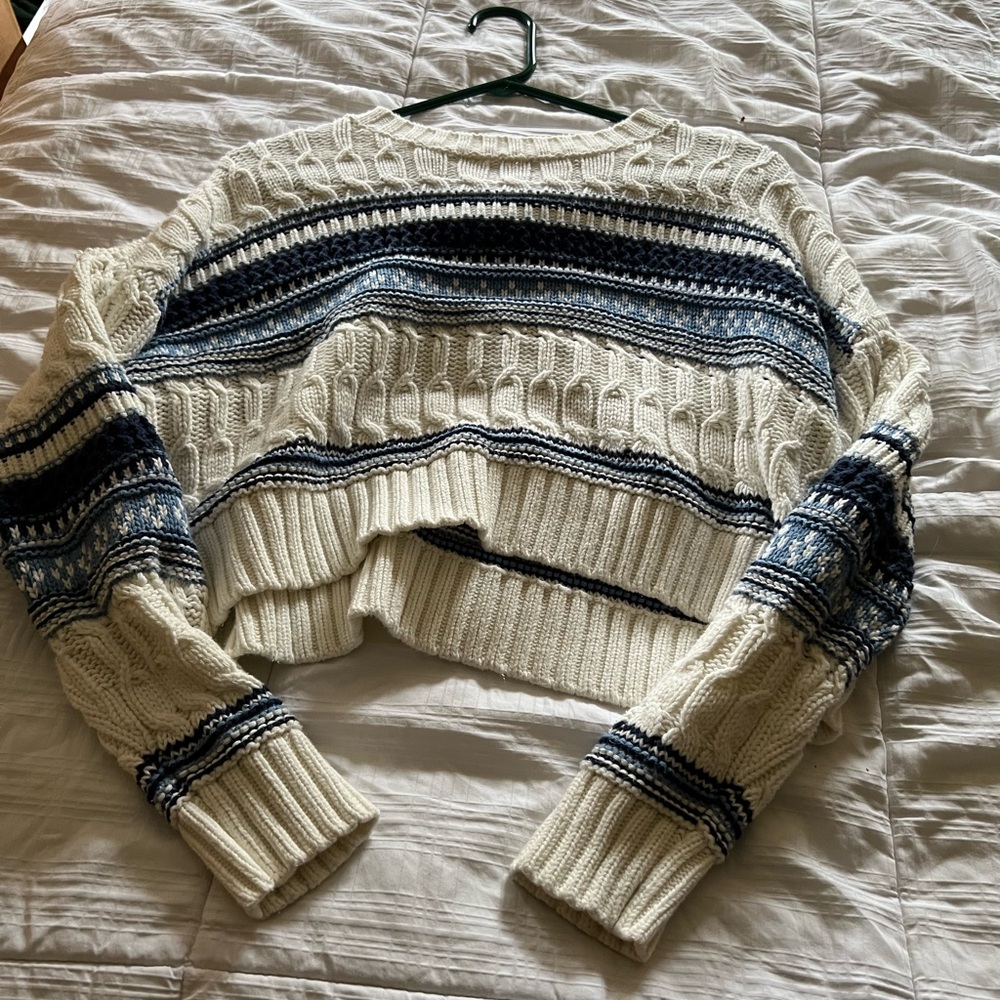 cream and blue sweater